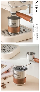 Close-up of 304 stainless steel coffee cup with removable wooden heat insulation sleeve