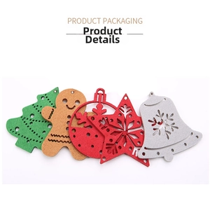 Detail showing gingerbread man and snowflake felt Christmas tree hanging decorations