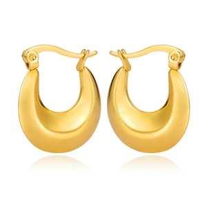 Polished gold U-shaped hoop earrings featuring a minimalist metallic chunky design