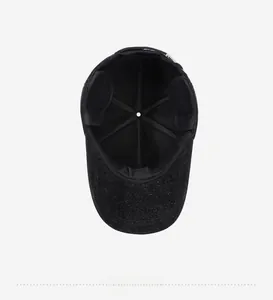 Detail view of the warm interior lining and foldable earflaps on winter baseball cap