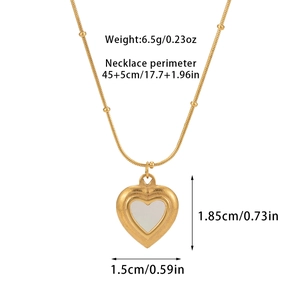 Detail showing 18k gold heart necklace with shell inlay and snake chain dimensions