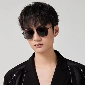 Detailed view of men's vintage polarized sunglasses with slim metal temples on model