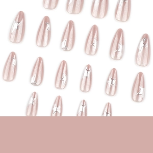 Sparkling pink cat eye press-on nails with silver 3D star patterns in almond shape