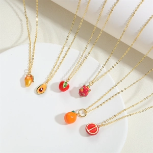 Close-up of colorful fruit pendants with 14K gold plating on elegant O-shaped necklaces