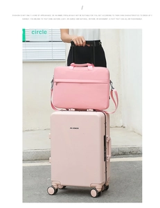 Pink laptop bag secured to a matching rolling suitcase handle for easy travel