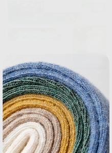 Macro detail of high-quality combed cotton socks with durable knit texture in multiple colors