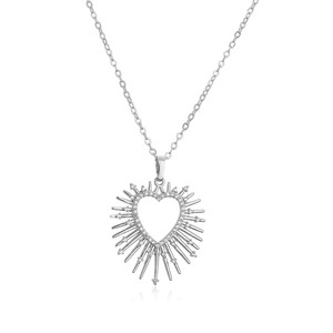 Detailed view of silver heart pendant necklace with radiant rays and micro-pave zircons
