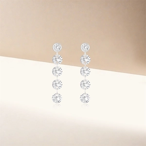 Close-up of S925 sterling silver tassel earrings with five luxury sparkling zircons