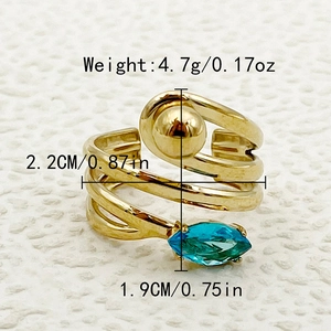 Detailed view of golden heart chain ring with teal gemstone and precise size specifications