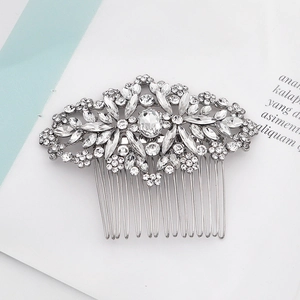 Elegant silver bridal hair comb featuring floral crystal rhinestones for wedding updos