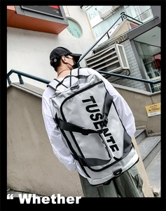Male model wearing gray Oxford fabric multi-functional backpack for fitness and travel