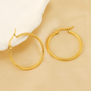 Polished 18K gold plated titanium steel hoop earrings with textured spiral design