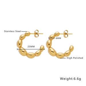 Macro detail of 25mm gold plated stainless steel beaded C-shape earrings with size labels