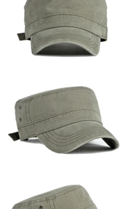 Detail view of army green washed cotton flat top cap with metal vents and stitching