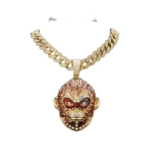 Golden Sun Wukong pendant with sparkling rhinestones and enamel on a Cuban chain