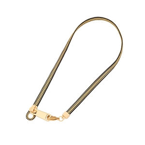 Modern black zipper choker necklace with golden metallic zipper teeth and slider detail