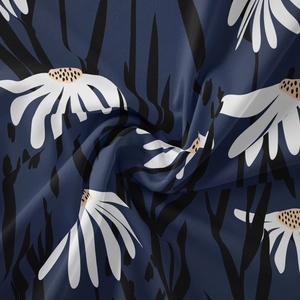 Detailed view of bohemian floral tapestry fabric with navy blue base and daisy prints