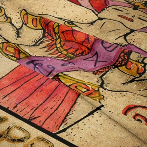 Close-up of bohemian fabric showing vintage print detail and soft woven texture
