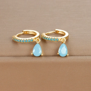 Detailed macro view of S925 silver water drop earrings with turquoise pavé accents
