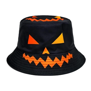 Close-up of black Halloween bucket hat with an orange Jack-o'-lantern smile print