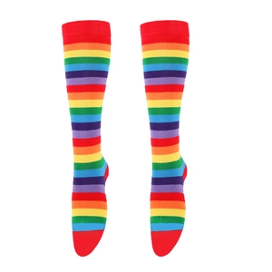 Detail of vibrant rainbow striped cotton socks showing knitted texture and colorful bands