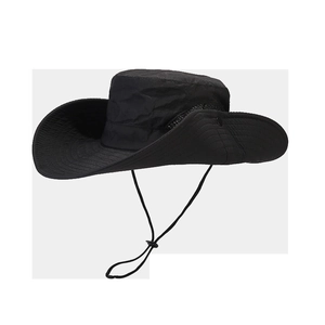 Detail of black wide brim sun hat featuring side snap buttons and adjustable wind cord