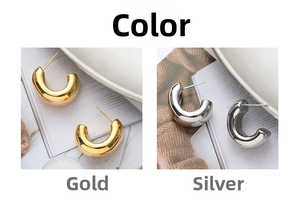 Detailed comparison of C-shape gold and silver plated chunky hoop earrings in high polish