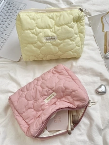 Quilted heart pattern cosmetic bags in pink and yellow with soft fluffy fabric