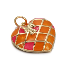 Detail of heart pendant with orange and pink checkered enamel and gold bow knot charm