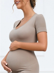 Detail von nahtlosem Rippenstoff einer formenden Umstands-Body-Kompression