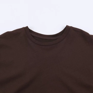 Deep brown crew neck pleated dress in premium jersey knit fabric on white background