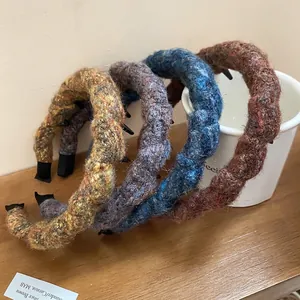 Set of four stylish acrylic wool braided headbands with textured high crown design