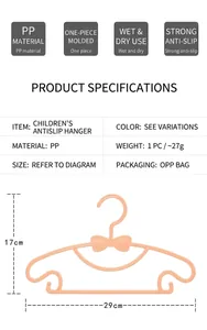 Detailed view of child-sized bow hanger with precise 29x17cm measurements for baby clothes