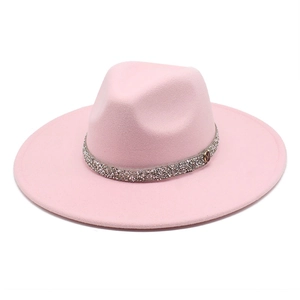Close-up of pink wide brim wool fedora with rhinestone band and silver M-logo charm