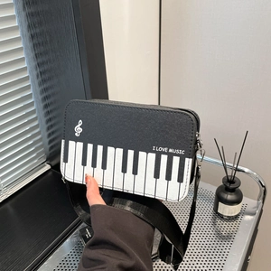 Winter piano key contrast shoulder bag with music notes and I Love Music print