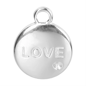 Macro detail of silver round LOVE pendant in polished stainless steel with engraving