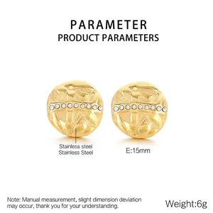 Detailed view of 15mm hammered stainless steel round earrings with cubic zirconia inlay