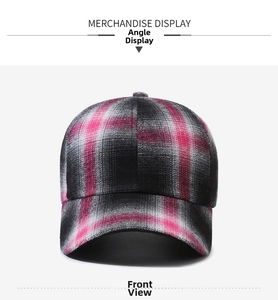 Close-up of pink and grey plaid pattern on a structured fabric baseball cap front