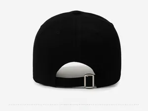 Detail view of cotton baseball cap with adjustable silver metal buckle on back