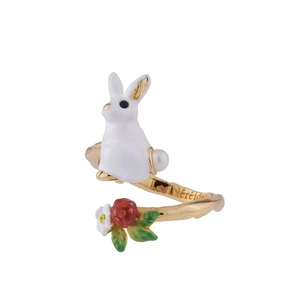 Detail of bunny ring with white enamel, red berries and flower in garden style