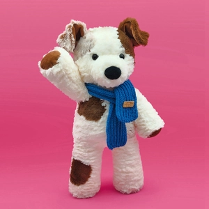 Animated waving white plush puppy toy with blue scarf on a vibrant pink background