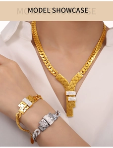 Detail shot of a titanium gold necklace and honeycomb bracelets with inlaid diamonds