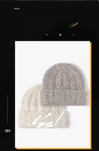Detail of warm knit beanie hats showing thick fuzzy texture in beige and grey colors