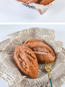 Top view of realistic rye bread model on newspaper with fork, warm bakery atmosphere