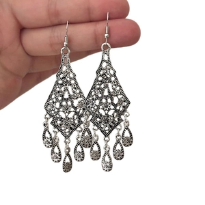 Vintage silver hollow flower teardrop tassel earrings in ethnic bohemian style