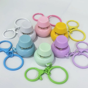 Set of six macaron-colored mechanical switch fidget toys with matching plastic clips