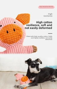 Detail of pink corduroy pig dog toy showing soft striped texture and plush padding