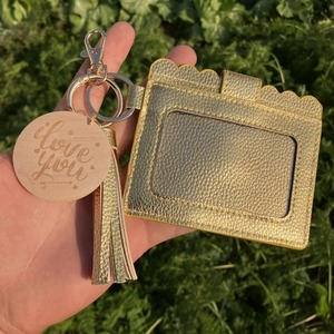Gold faux leather card holder detail with tassel, keyring and engraved I love you tag