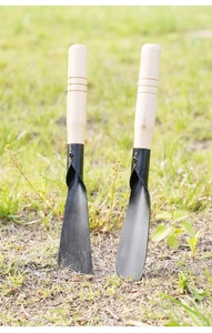 Garden tool set with pointed and flat shovels, black metal blades and wooden handles