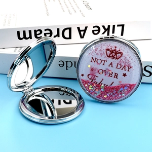 Miroir de poche à sables mouvants rose avec couronne et loupe pliante double face